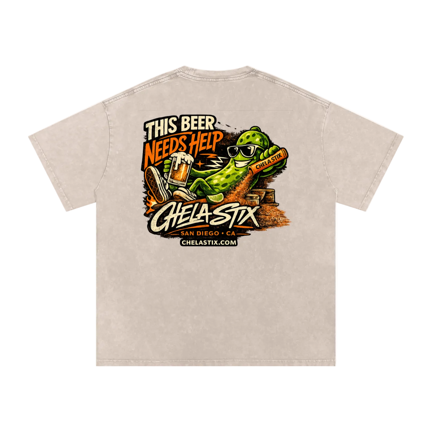 A light beige short-sleeve t-shirt with a large graphic print on the back. The graphic features a green alligator wearing sunglasses and holding a beer mug, with text reading 'THIS BEER NEEDS HELP' and 'CHELA-STX' in stylized lettering.