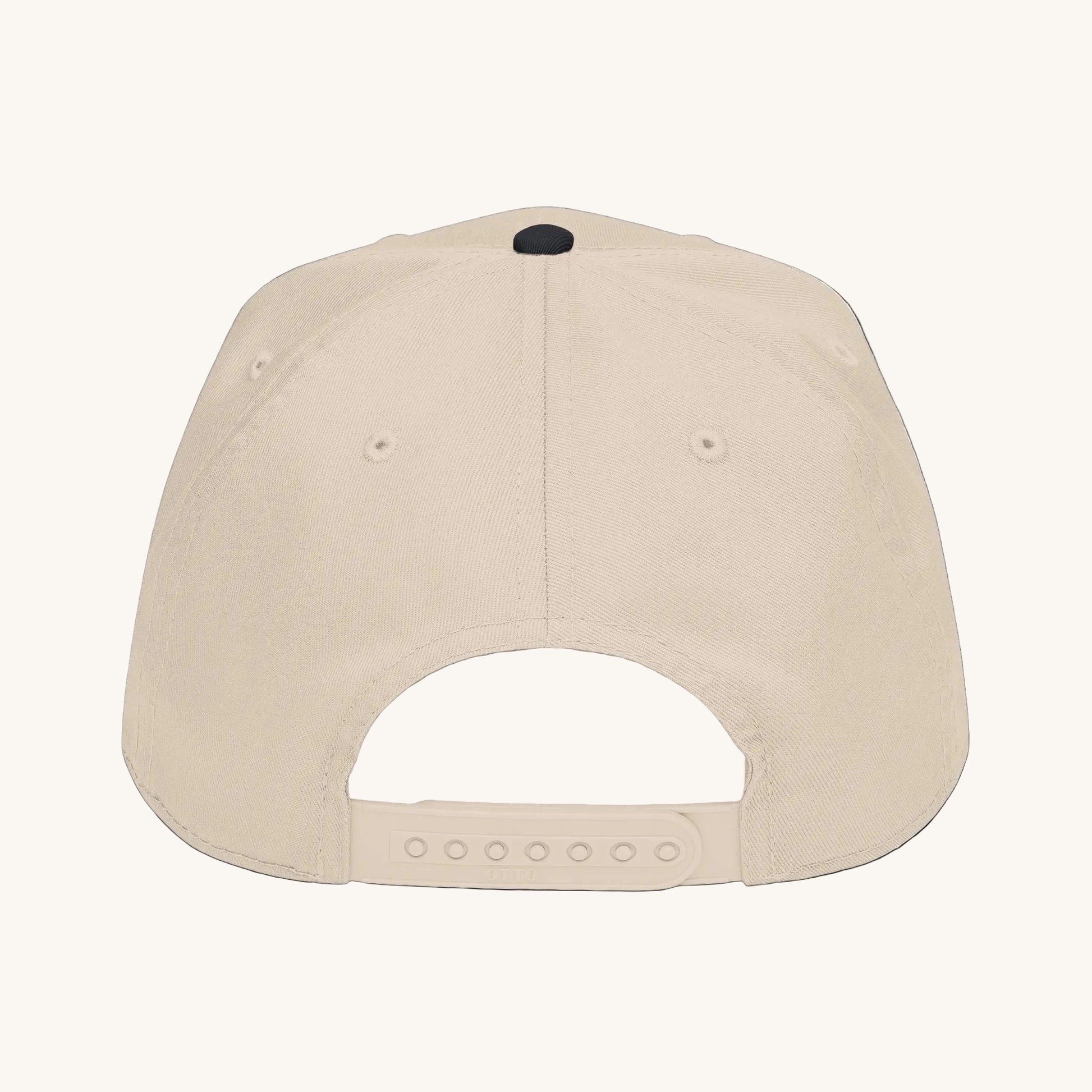 The back view of a beige snapback cap with a dark green button on top, shown against a plain white background.