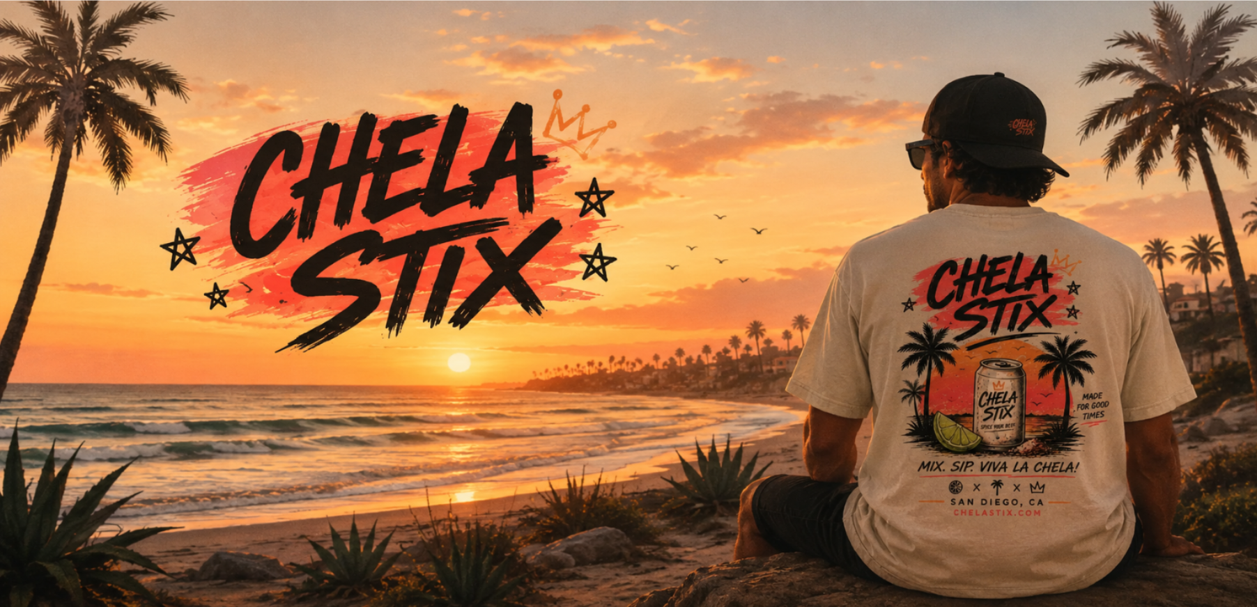 A man sits on a beach at sunset facing the ocean, wearing a white graphic T-shirt with 'CHELA STIX' printed on the back. Palm trees line the shore, and the sky is orange and pink.