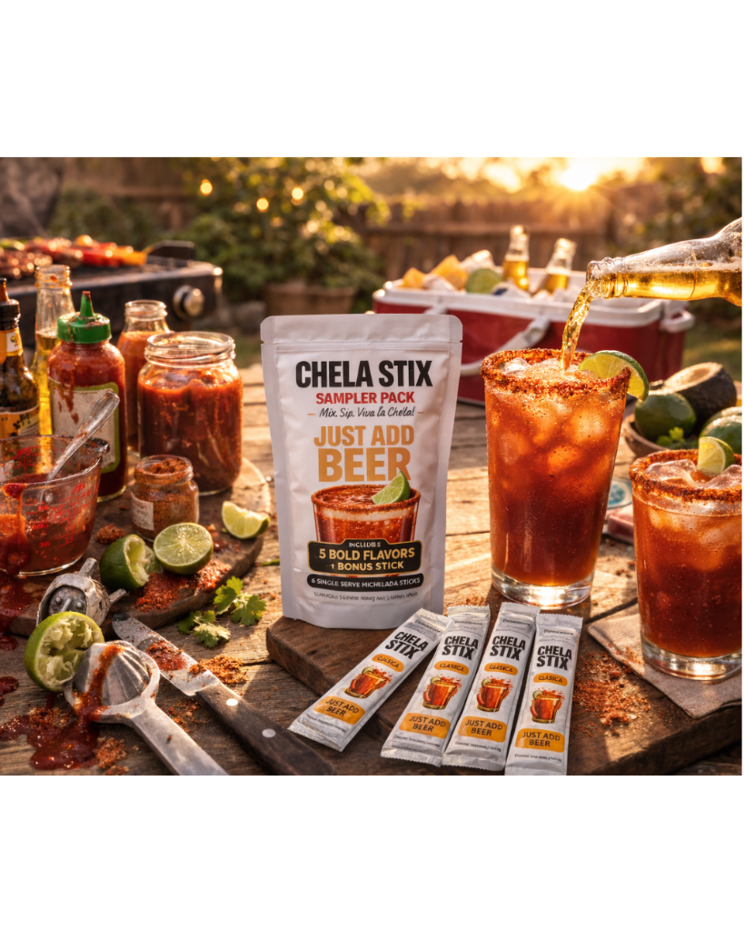 Chela Stix sampler pack with beer-themed cocktails and snacks on a wooden table outdoors.