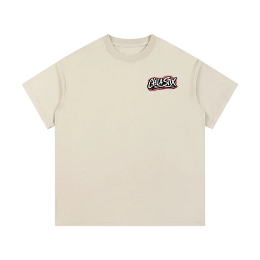 A cream-colored short-sleeve crewneck t-shirt with a small 'Cell Six' graphic printed on the left chest, displayed on a clean white background.