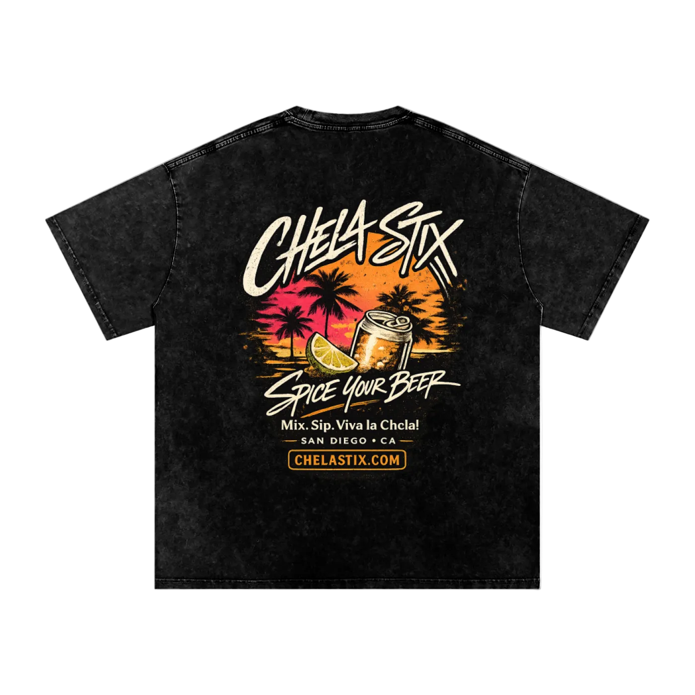 A black acid-wash t-shirt with a colorful graphic on the back featuring the brand name 'Chela Six' in white script, a beer can, a slice of lime, and a sunset background with palm trees. Text below reads 'Spice Your Beer' and includes 'San Diego + CA' and 'ChelaSix.